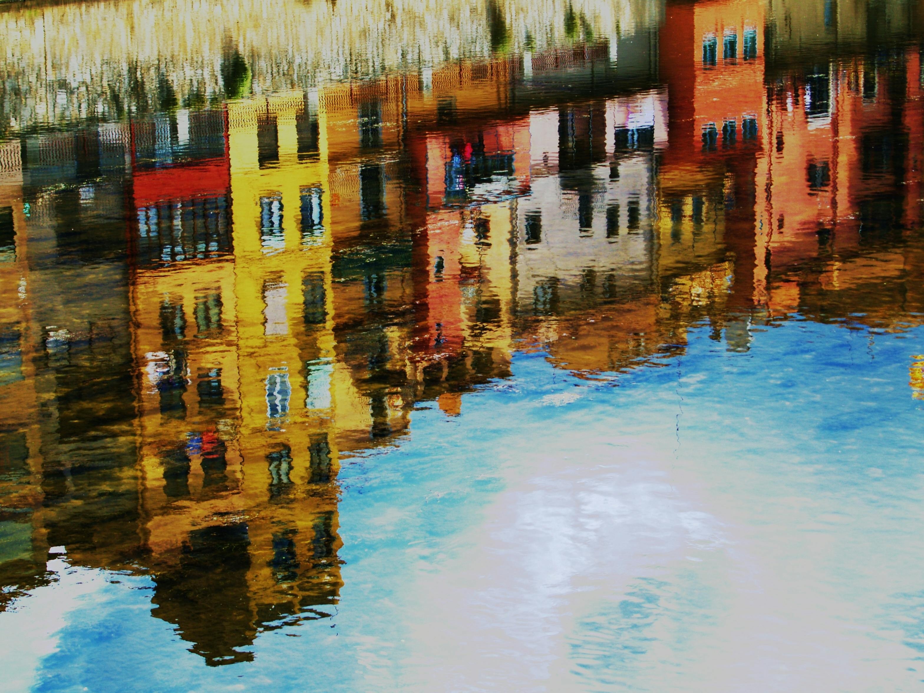 ["city","painting","buildings","water"]
