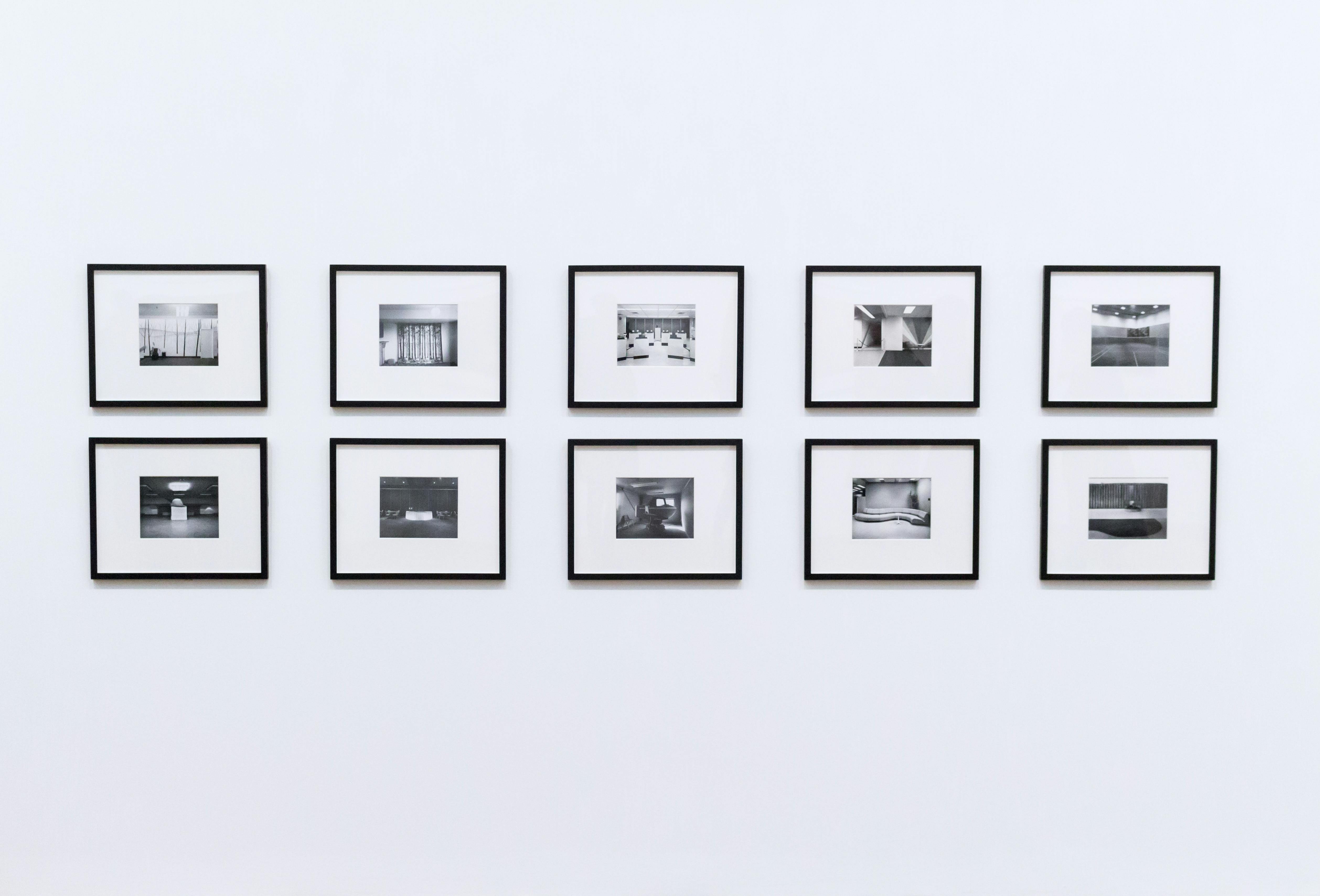["wall","photographs"]