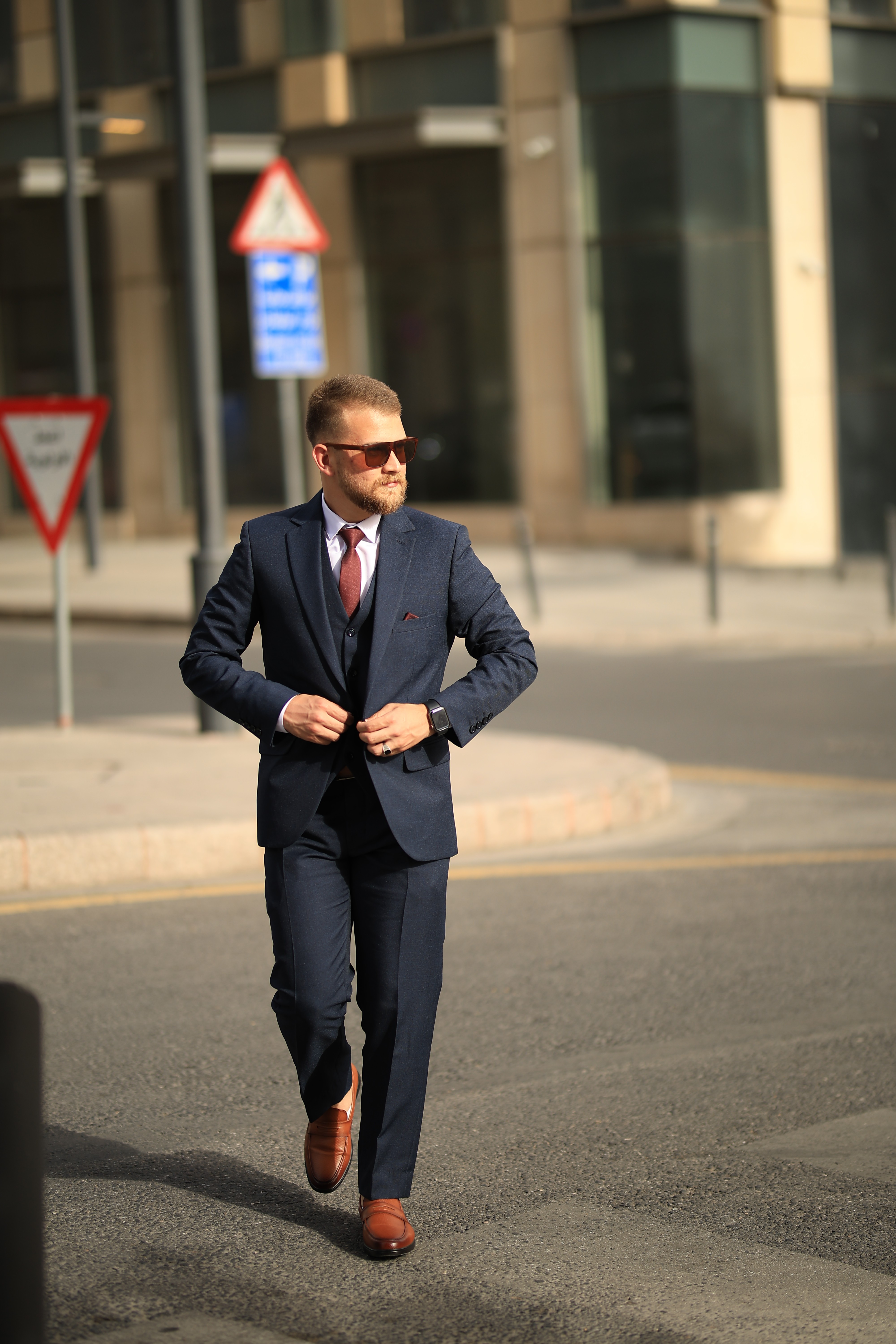["street","suit","man"]